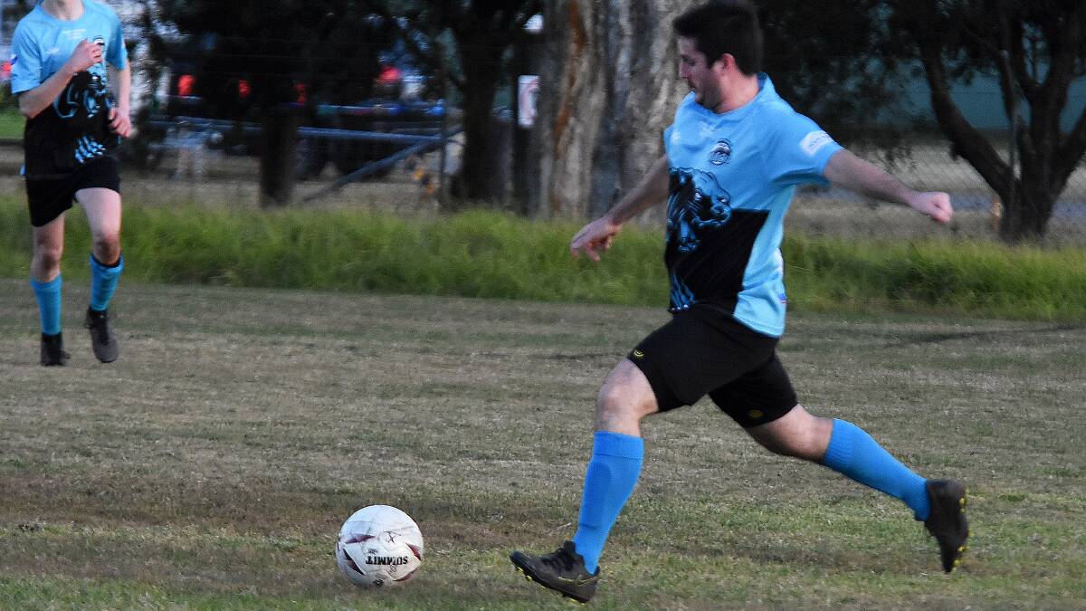 Daniel Berner goes on the attack for Taree in the 3-0 loss to Port United at Omaru Park last week. The Wildcats host Sawtell tomorrow.