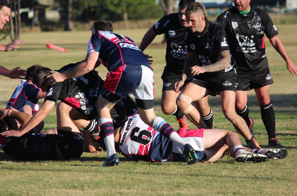Manning Ratz five-eighth Ricky Campbell in the thick of the action in the Lower North Coast Rugby Union clash against Wauchope at Wauchope. Photo Port News.