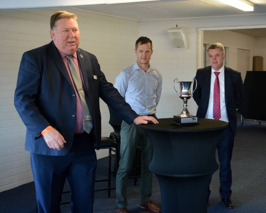 Manning Valley Race Club chairman Greg Coleman at last year's Taree Cup presentation with winning trainer Jason Deamer and Justin Stack from the sponsors, Stack Law Firm.