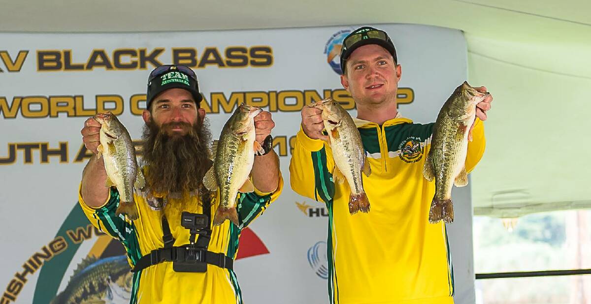 Kris Hickson and Tom Slater show off some of their catch at the world championships.