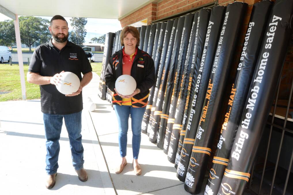 Transport NSW's Aboriginal projects officer Brendan Jensen and Manning Valley Netball president Janine Kennewell with some of the equipment sponsored by Transport NSW.