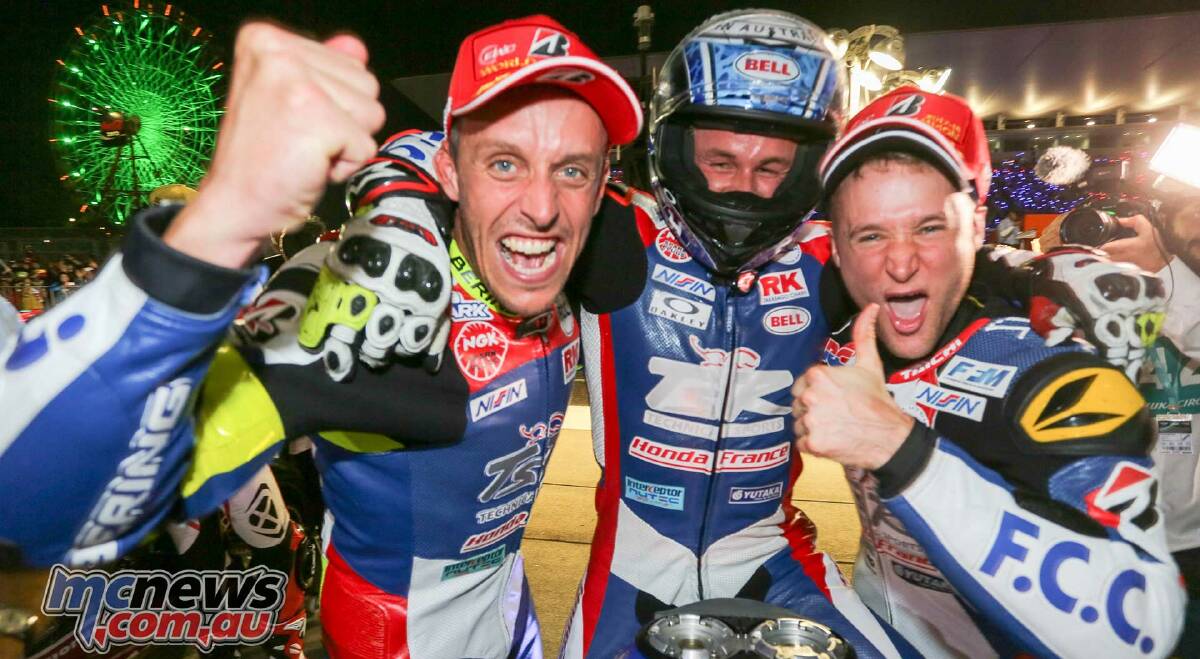 How sweet it is: Josh Hook and his t FCC TSR Honda team-mates Freddy Foray and Alan Techer celebrate their world championship win. Photo McNews.com.au