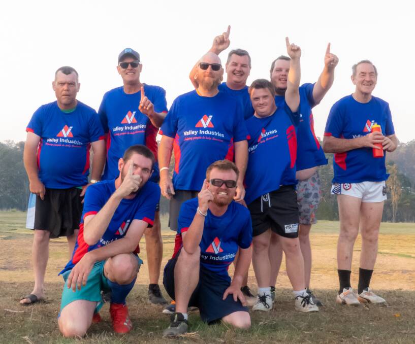 Tops in touch: Valley Industries touch footy players after their most recent game at Wingham (from left) Sean Darcy, support worker Geoff Pensini, Brady Carney, Nathan Ritter, Mitch Hoppe, support worker Darren Varty, Yanik Faugeras, Jack Shelton and Greg Hile