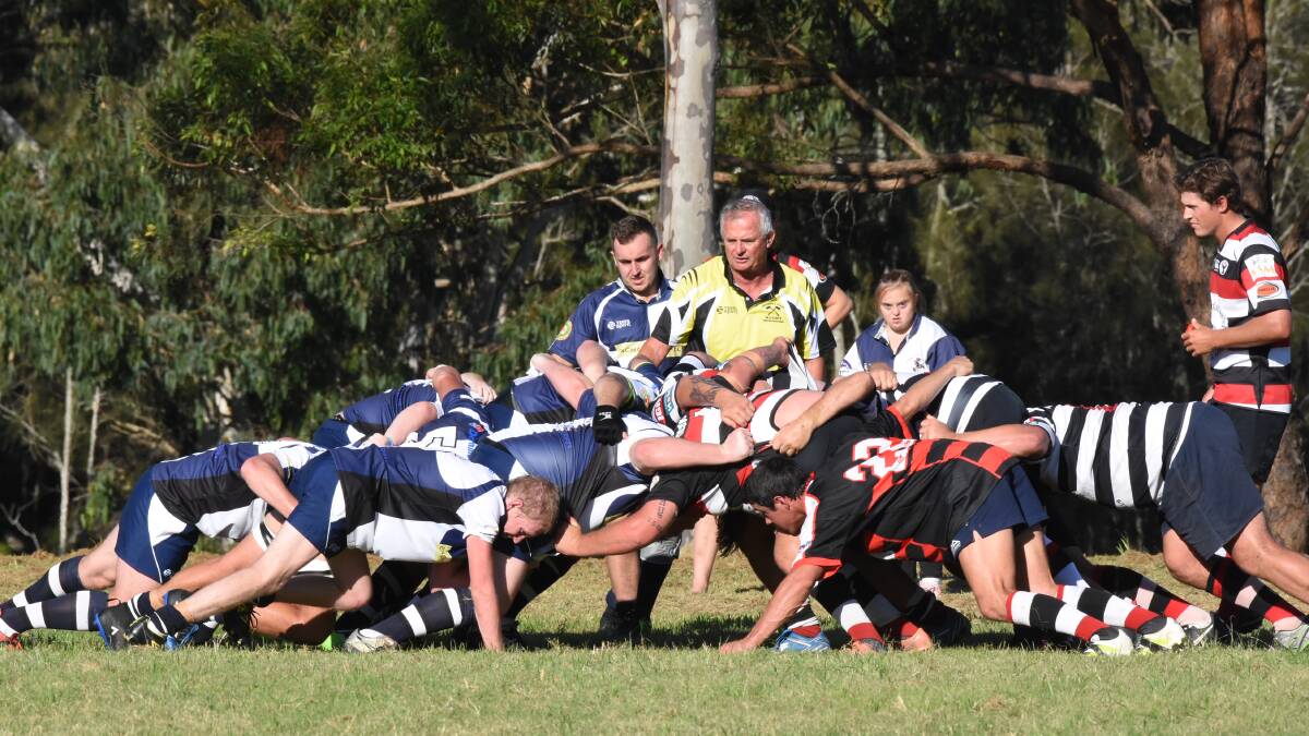Packing down: Manning Ratz and Gloucester forwards face off in a scrum in the opening round clash at Taree. The sides meet at Gloucester on Saturday.