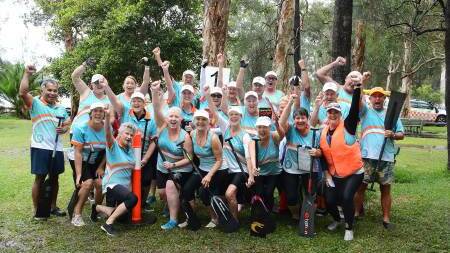 Manning Dragon Boat Club members celebrate their successes at the Great Lakes Pearl Dragons Regatta held at Forster Keys.