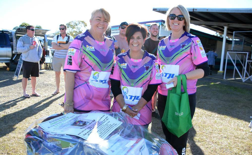Can Assist volunteers Sue Allport, Michelle Cole and Tracie Rushworth selling raffle tickets at last year's Krystylea Bridge Cup day.
