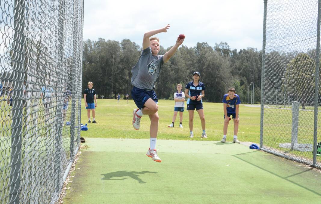 Zane Hopkins bowling in the nets during Manning under 14 representative team's practice session at Taree Recreation Ground. The Mid North Coast junior representative season is scheduled to start on Sunday.