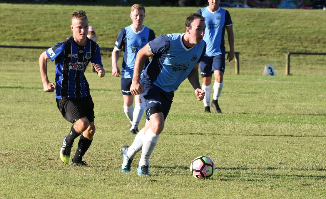 Taree's Ricky Campbell on the ball during the clash against Port Saints at Omaru Park. The Wildcats won 4-2.