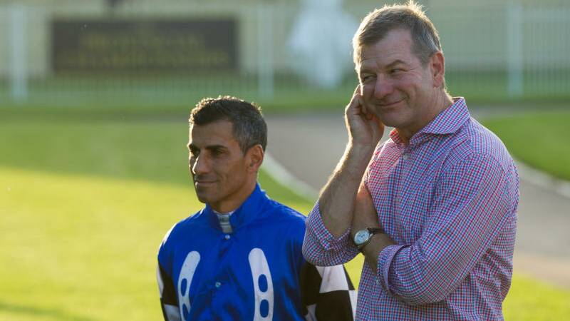 Leading trainer Kriss Lees with jockey Jeff Penza at Newcastle. Lees will provide three winners in Sunday's Taree Gold Cup. Photo Max Mason-Hubers