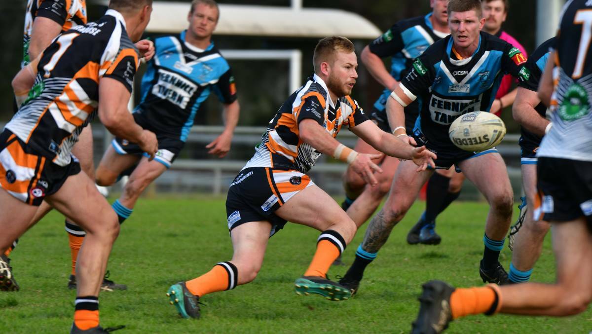 Mitch Collins gets the ball away during a clash against Port Macquarie Sharks last season.