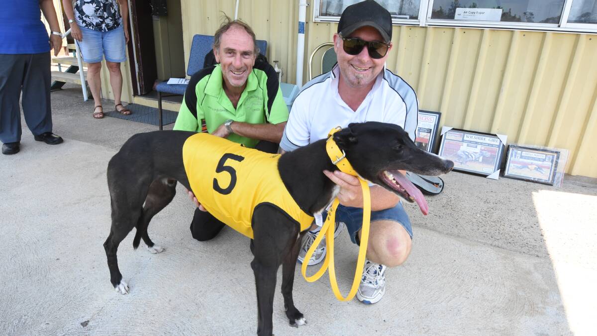 Taree Greyhound Club president Des McGeachie with successful trainer Cfaig Last at the club's meeting on February 1. Taree run a TAB meeting for the first time on Wednesday June 17.