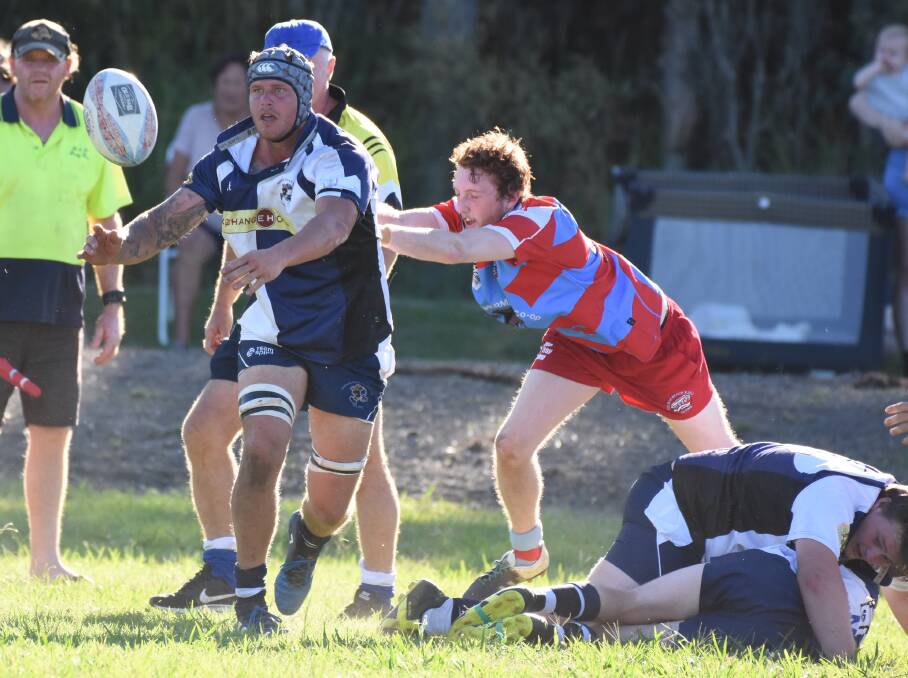 Manning Ratz co-captain Sam Hartnett offloads during the round two clash against Old Bar. The Ratz meet Forster-Tuncurry at Taree on Saturday.