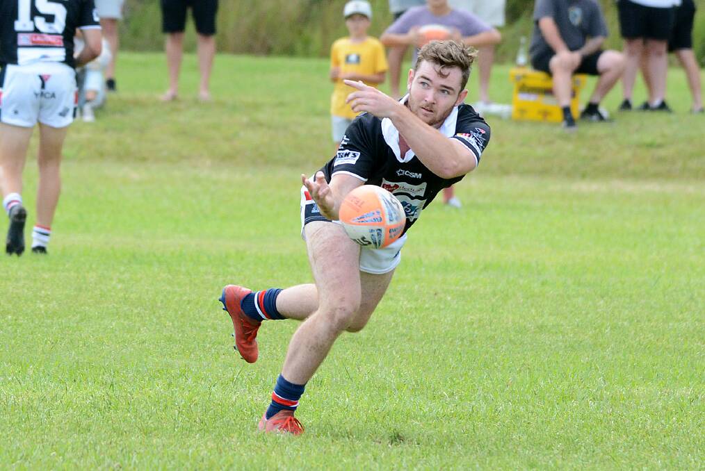 Old Bar utility player Toby De Stefano spins out a pass during the Pirates trial game against Byron Bay in March.