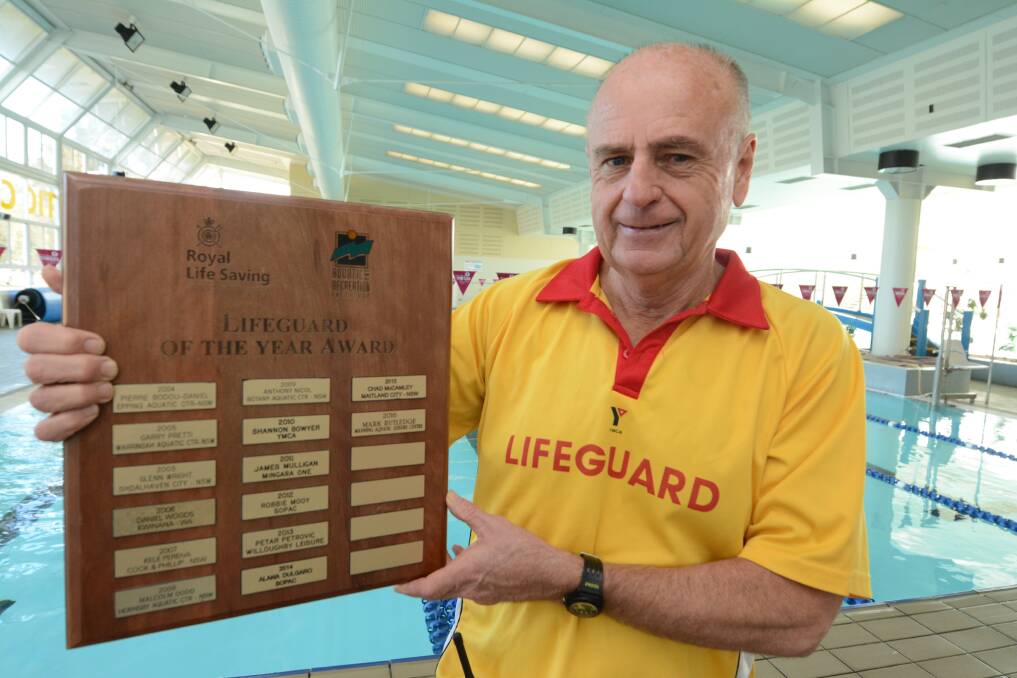 Mark Rutledge at the Manning Aquatic and Leisure Centre with his award for NSW Lifeguard of the Year.