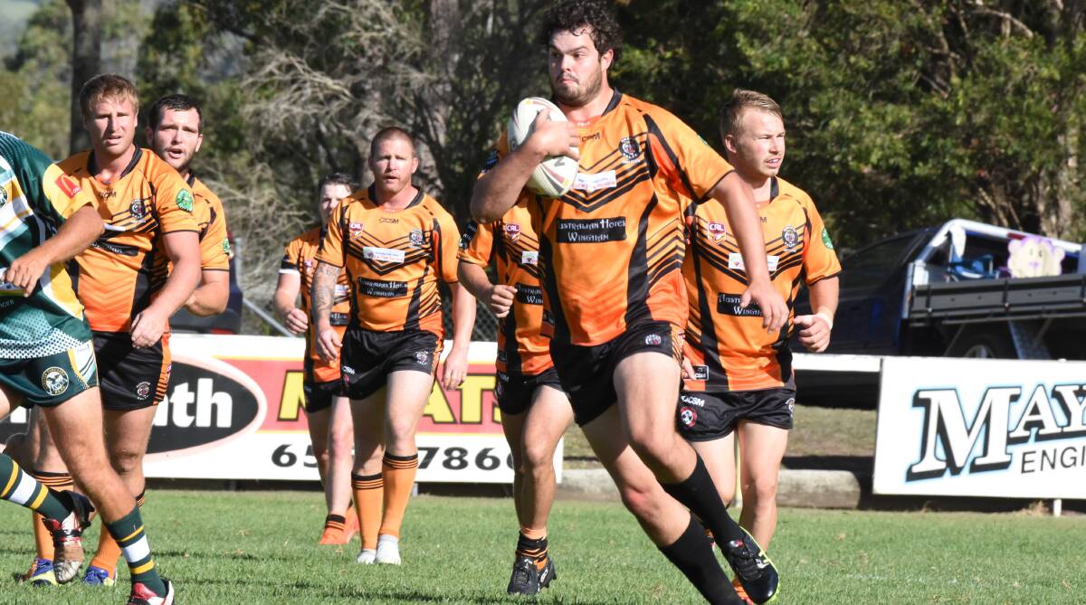 Wingham second rower Trent Grofos carts the ball forward in the clash against Forster-Tuncurry at Wingham.