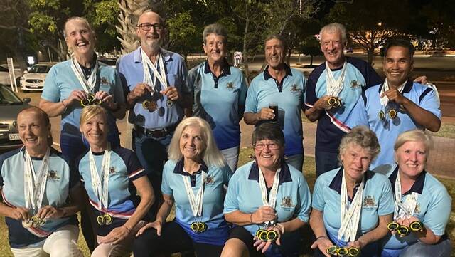 Manning Dragon Boat Club members at the national championships in Adelaide (back from left) Wendy Orman (assistant coach), John Roetman, Fay Brooks (manager), Joe Iacono (coach), Warren Blanch (captain), Jess Diamoy. Front Andrea Manticas, Cassandra Kyle, Maureen Pratten, Louise Watson, Judi Poole (drummer), Karen Drury.
