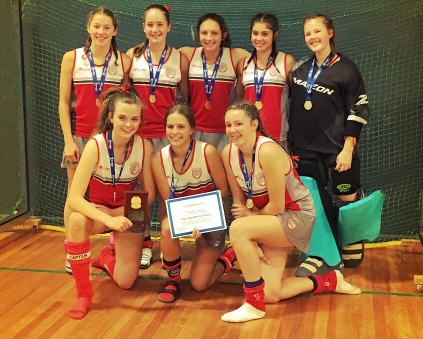 Manning under 15 girl's indoor hockey team after their win in the State division one final this week.