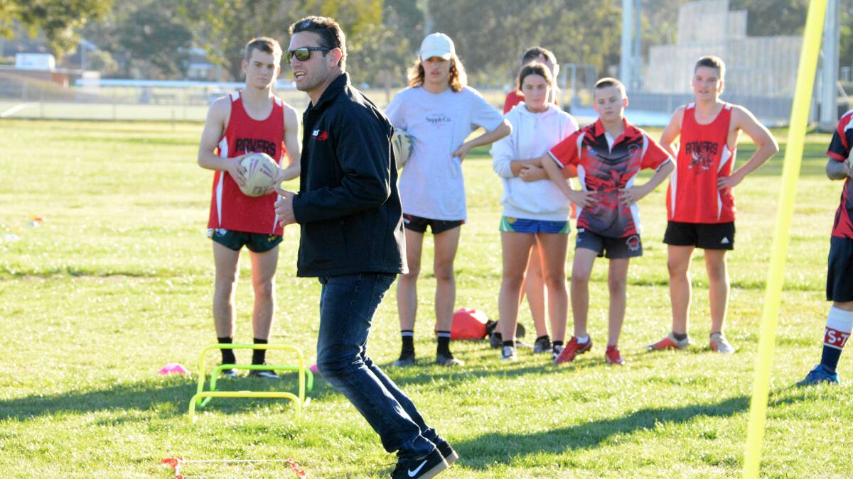 Rugby League great Danny Buderus conducts a coaching clinic at Taree Recreation Ground last year, where he voiced concern at the deterioating condition of the fields.