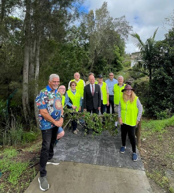 Uncle Russell Saunders, Cr David West, Qdrian Punuccio and member of the Friends of Browns Creek at the official opening of the new boardwalk.