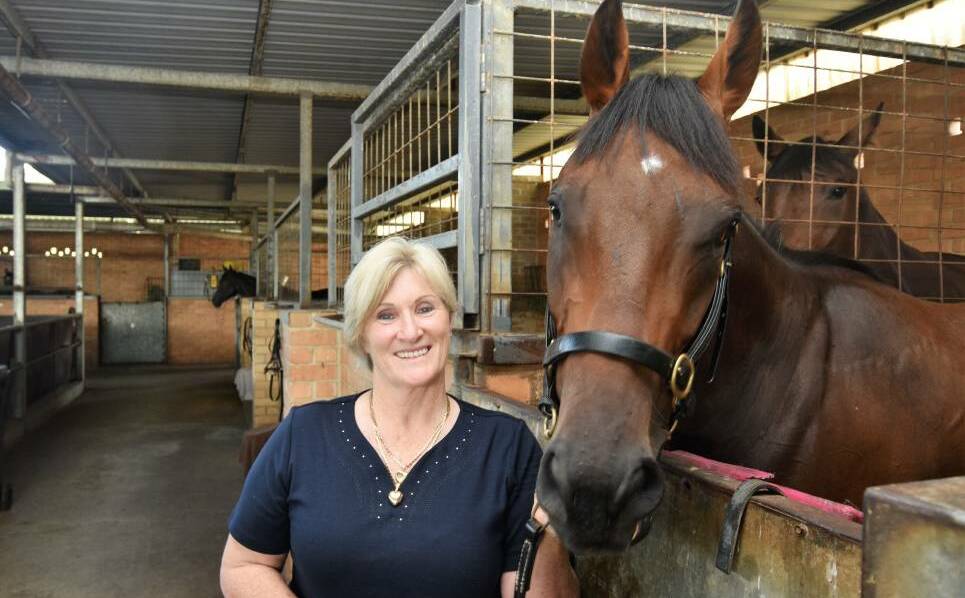 Jenny Graham with stable star Victorem. A win last Saturday has ensured Victorem a start in the Stradbroke next month. Photo Port News.