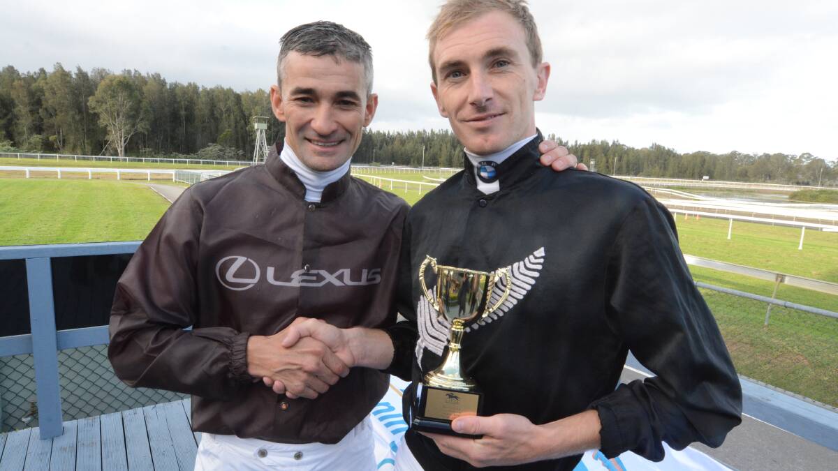 Corey Brown congratulates Ben Looker after Looker's win in the Corey Brown Cup at the Manning Valley Race Club meeting.