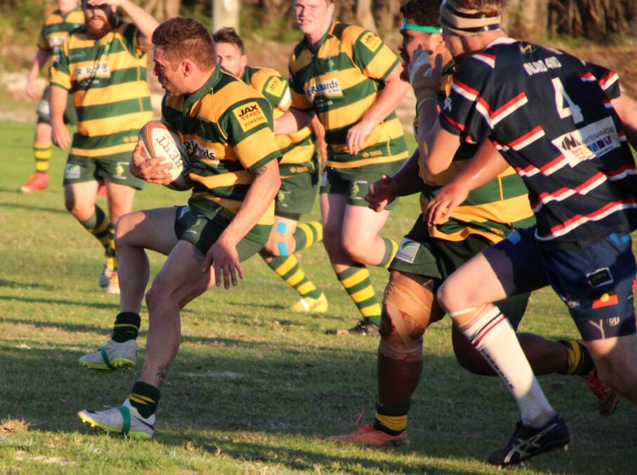 Forster winger Steve Stanton on the attack during his busy game against Wauchope Thunder at Tuncurry.