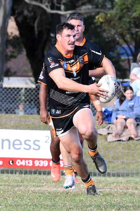 Wingham centre Tim Bridge makes a run last season. The Tigers are pushing to extend the 2024 competition to 17 games.