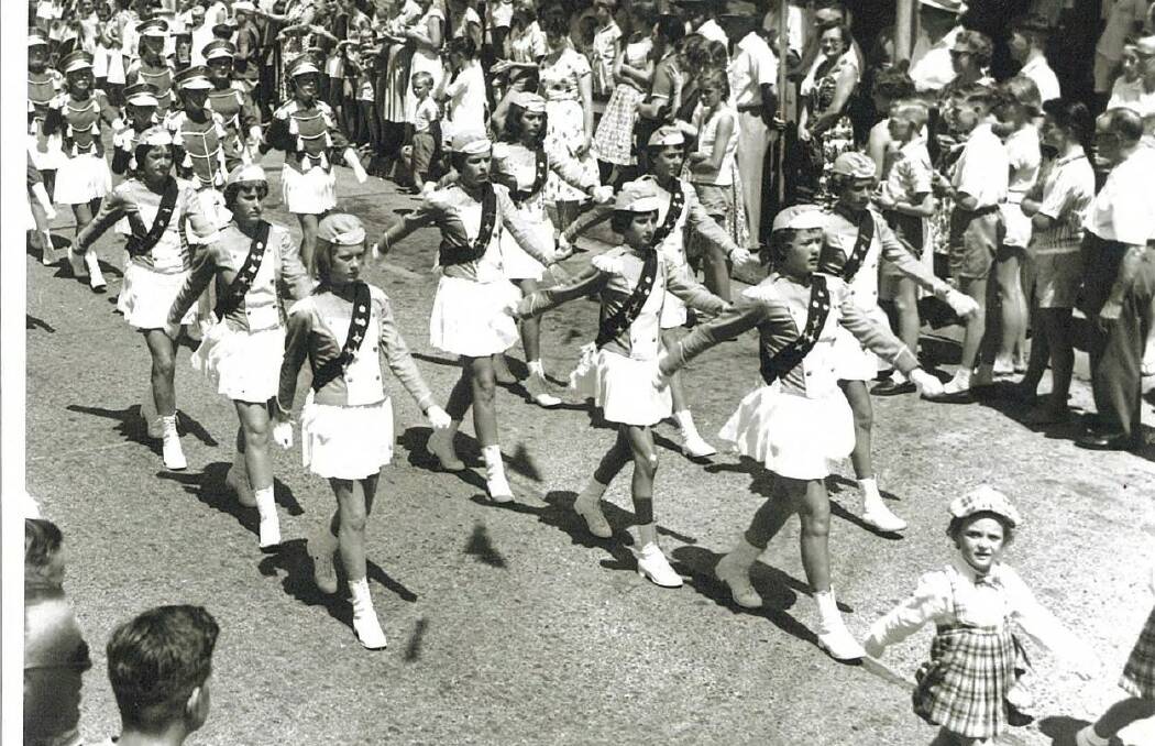 Cundletown Rondaleers marching at the 1960 Aquatic Carnival in Taree.