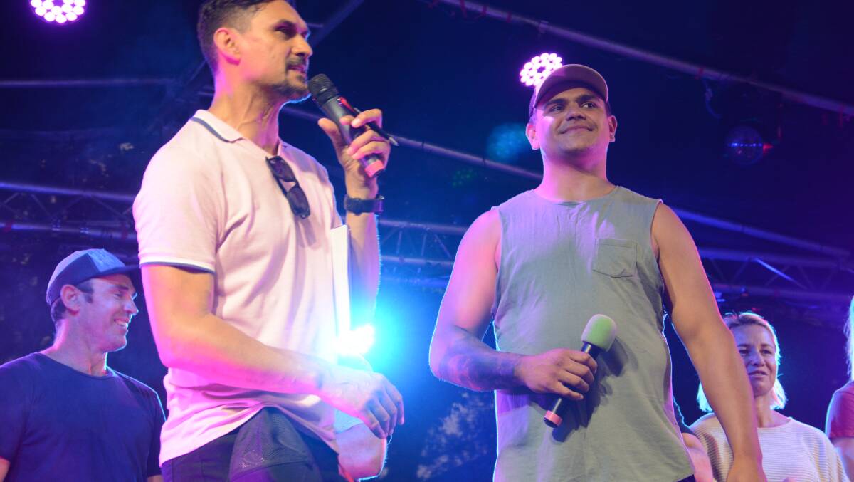 Latrell Mitchell with MC Andy Saunders at last year's Carols by Candlelight held in Taree.
