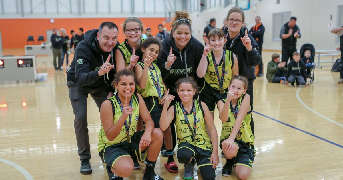 We are the champions:  Back from left Steve Atkins (coach), Ciara Wilkinson, Imogene Lawton, Yvette Wilkinson (coach), Arabella Roohan, Katrina Roohan (Manager) Front Jannarlia Dumas, Jessie Cochrane and Jessica Hogan. Absent Cameron Galle (coach) Tiffany Nguyen. Photo Basketball NSW.
