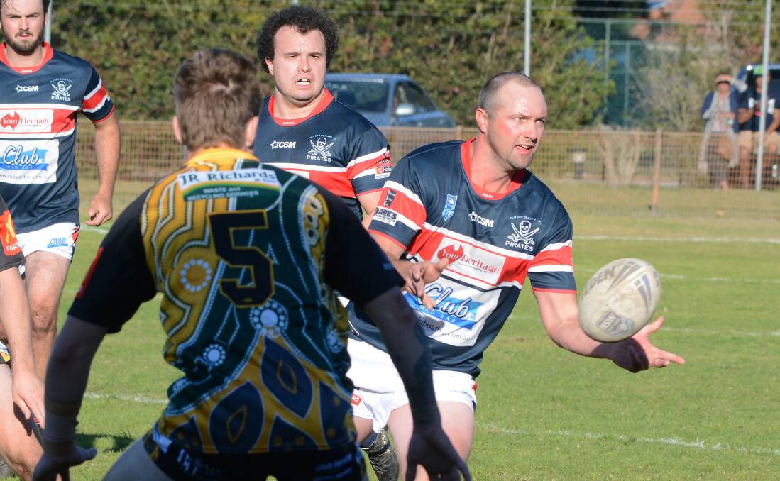 Steve Sansom gets a pass away during his comeback game against Forster-Tuncurry.
