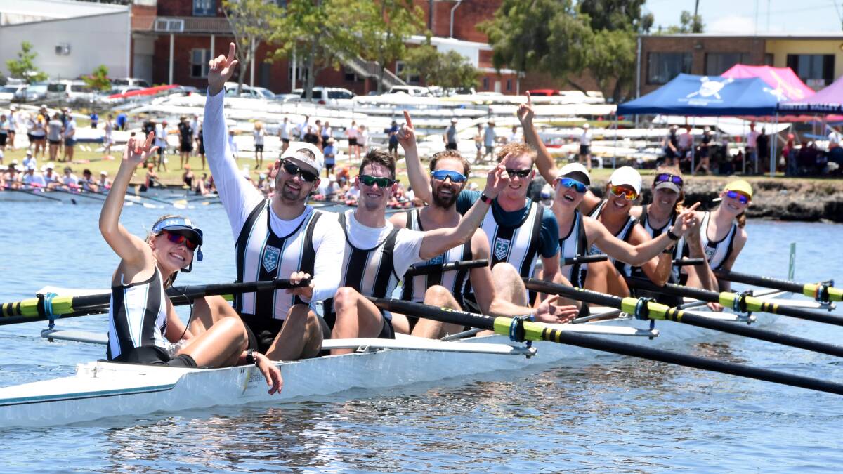 We are the champions: UTS (1) crew members celebrate their win in the Stack's Finance-Croker Oars Mixed Eight Challenge at Taree on Saturday. Photo Scott Calvin.