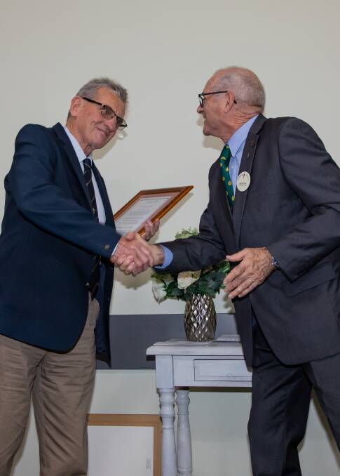 Tim Becker of Legacy Sydney congratulates Wayne Mason of Stuarts Point on his appointment as president of Legacy Mid North Coast. Photos: Mick Birtles