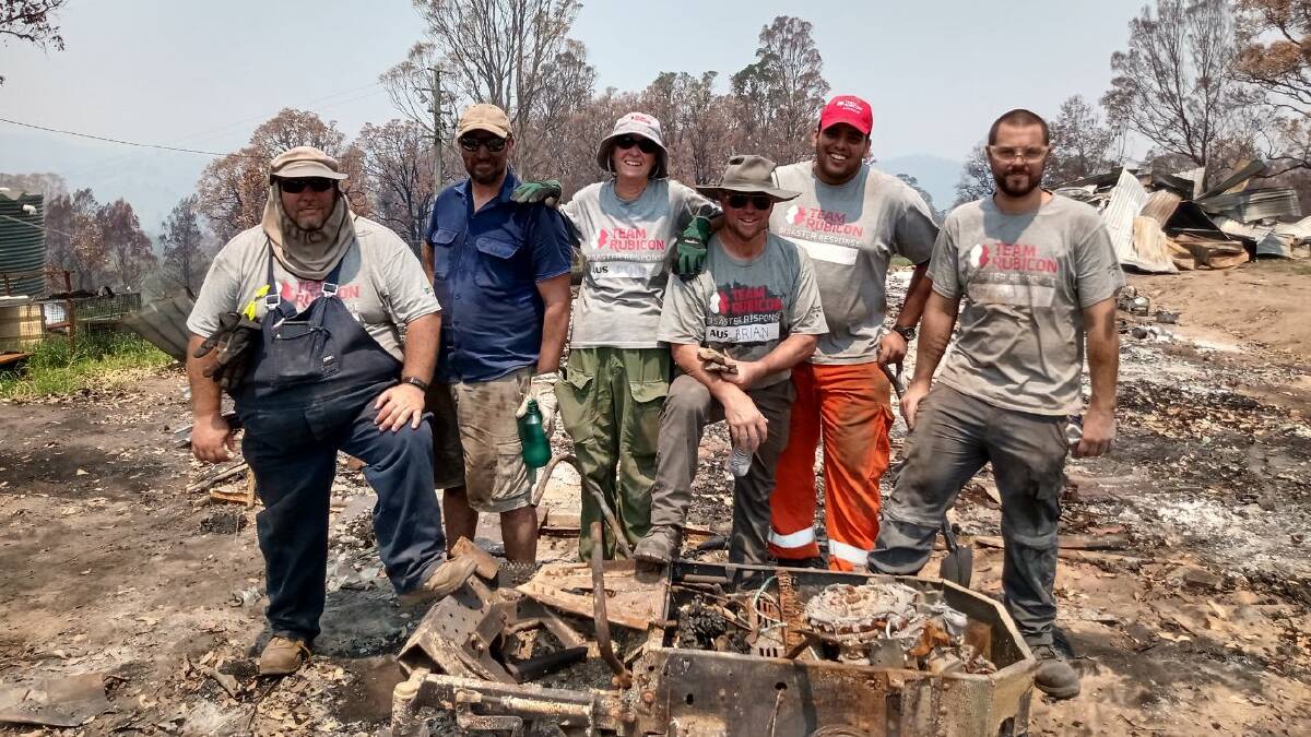 Scott Herring (second from left) with Team Rubicon's 'first wave' following the Cobargo bushfires. Photo submitted