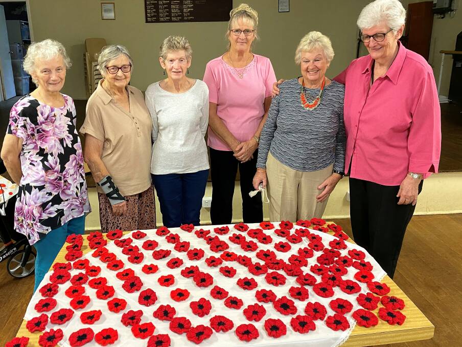 Old Bar Craft ladies with poppies that have created for the Field of Remembrance.