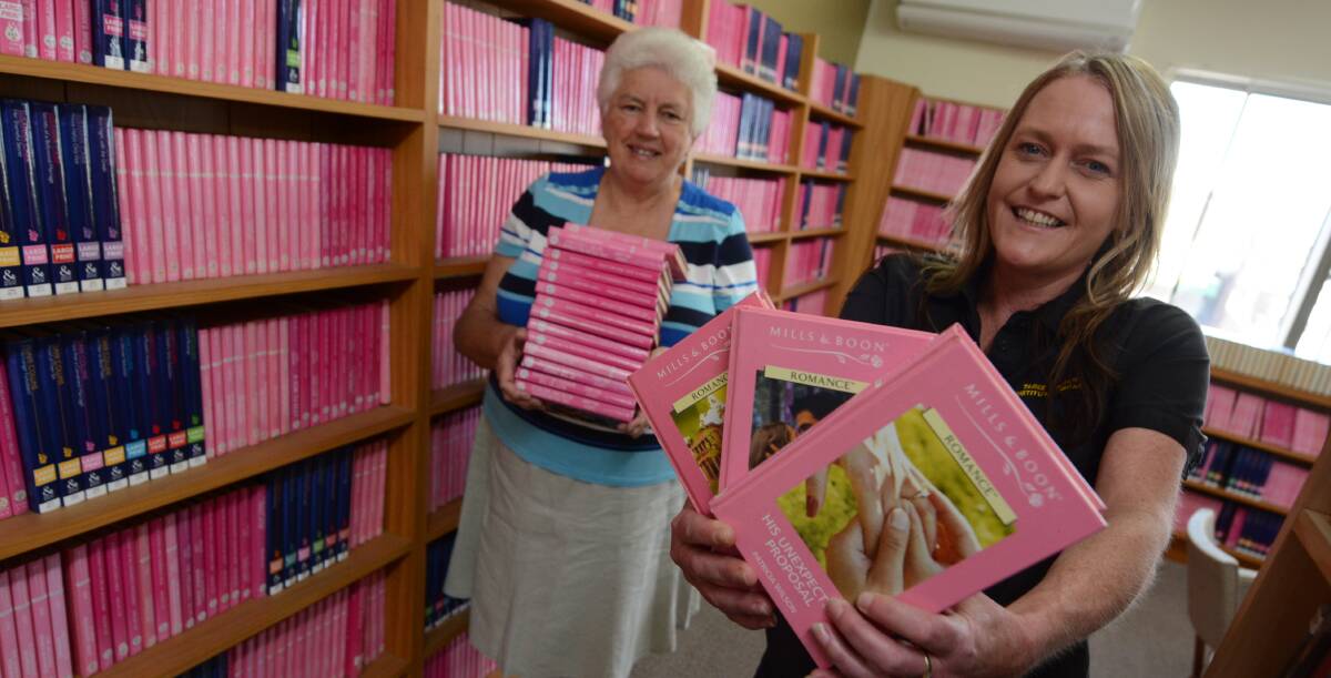 Taree Literary Institute secretary Suzanne Booth and librarian Kylie Attard invite the community to join its growing membership.