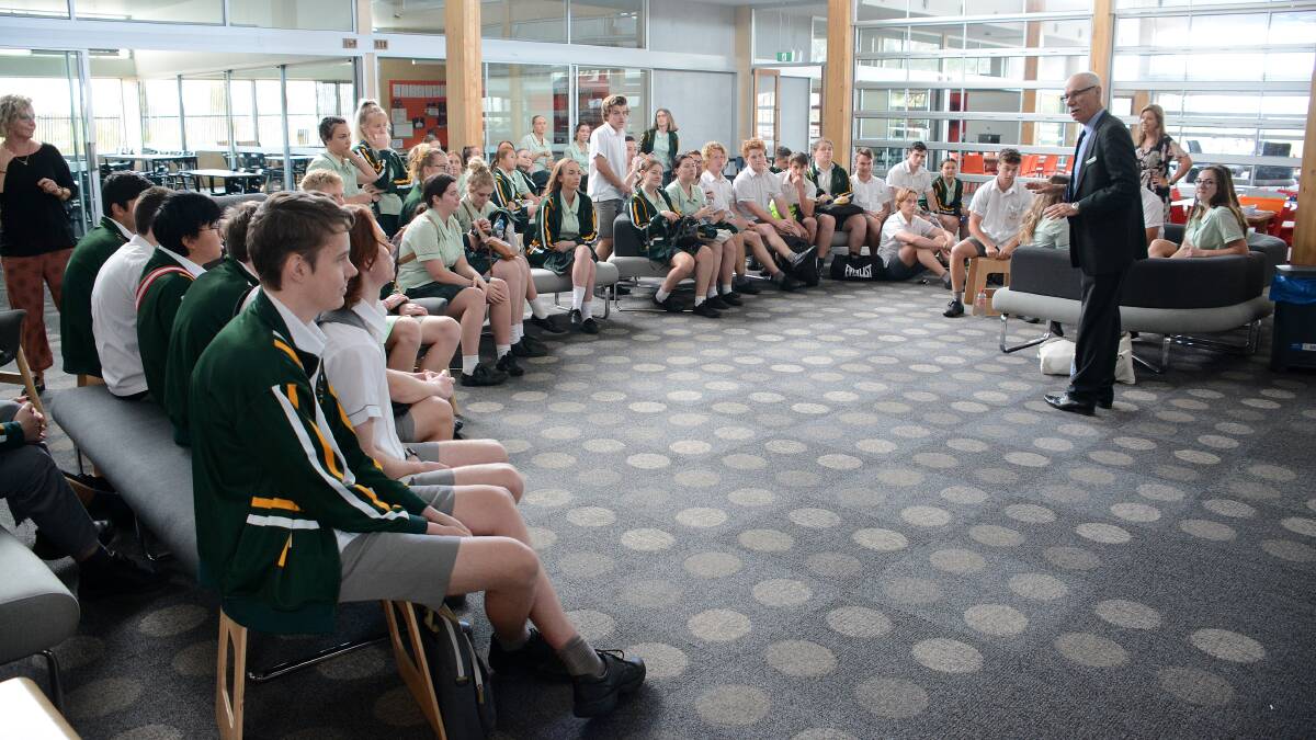 St Clare's High School principal Peter Nicholls speaking with the HSC students after their first exam.