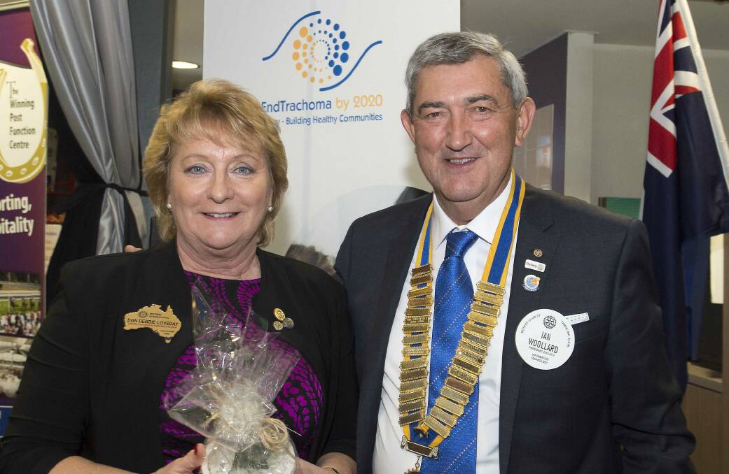 Incoming president of the Rotary Club of Taree, Ian Woollard with future District Governor Debbie Loveday. Photo Ashley Cleaver/Cleavers Images