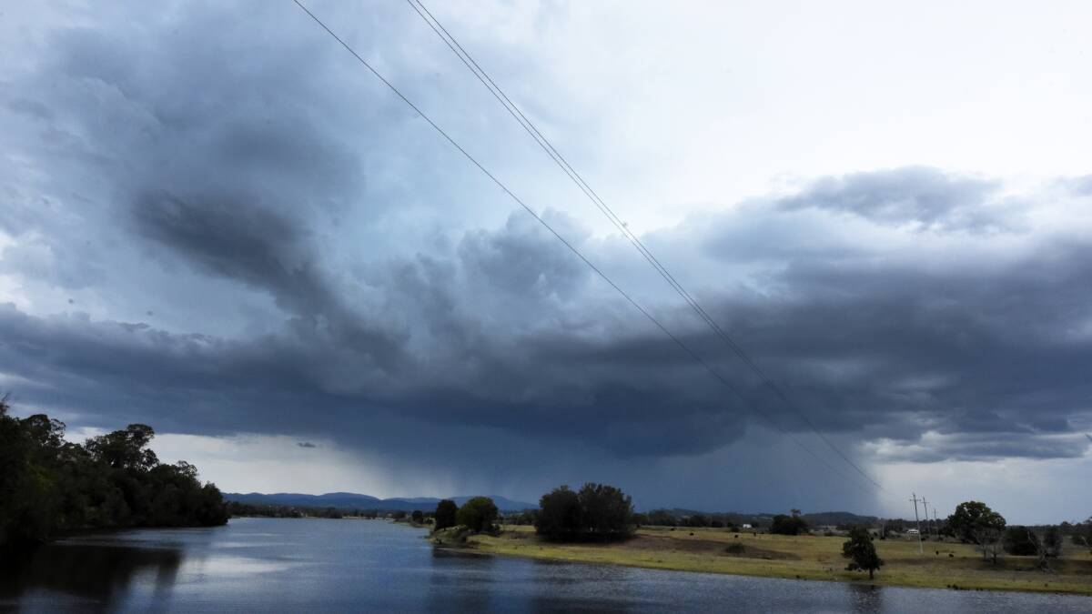 A thunderstorm taking shape across the Manning River at Taree on Friday afternoon.