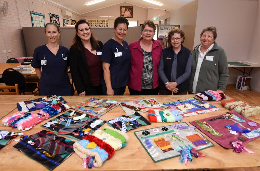 Craft for therapy: Manning Hospital's Naomi Case, Erin Hunt and Karen DeGioia with Pam Eyb, Anne Fernley and Leith Colledge from Taree Craft Centre.