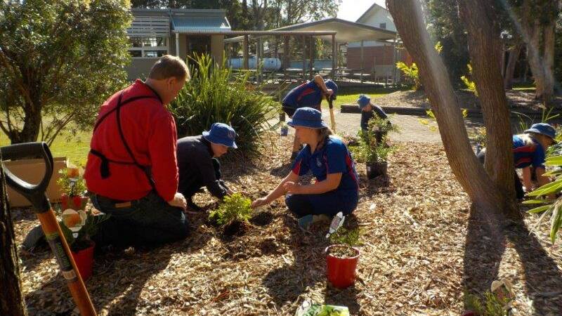 Cundle students take up the trowel on School Tree Day