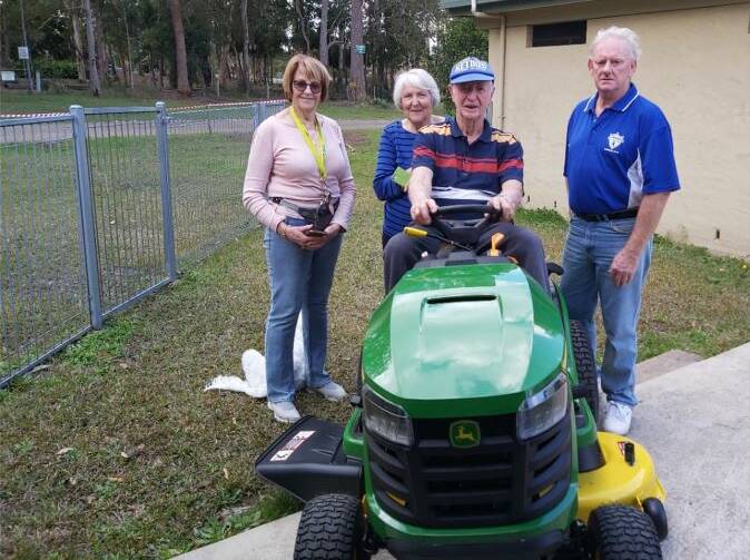 Lansdowne Community Hall manager Rhonda Hardes committee member Gai Mayers, manager Neville Mayers and manager Wayne Burns are very happy with their new ride-on mower.