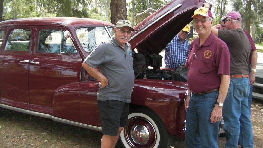 Greg Silver sharing his immaculate 1946 Chevrolet with club members Arthur Broadley,Bill Coulton, Bruce Yarnold and David Kelvin at the Billabong Park in Gloucester