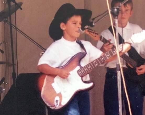 James Johnston performing on stage when he was six years old. Picture supplied