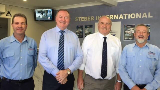 Minister David Elliott (second from right) welcomed to Taree by Colin Steber, Steve Bromhead and Alan Steber