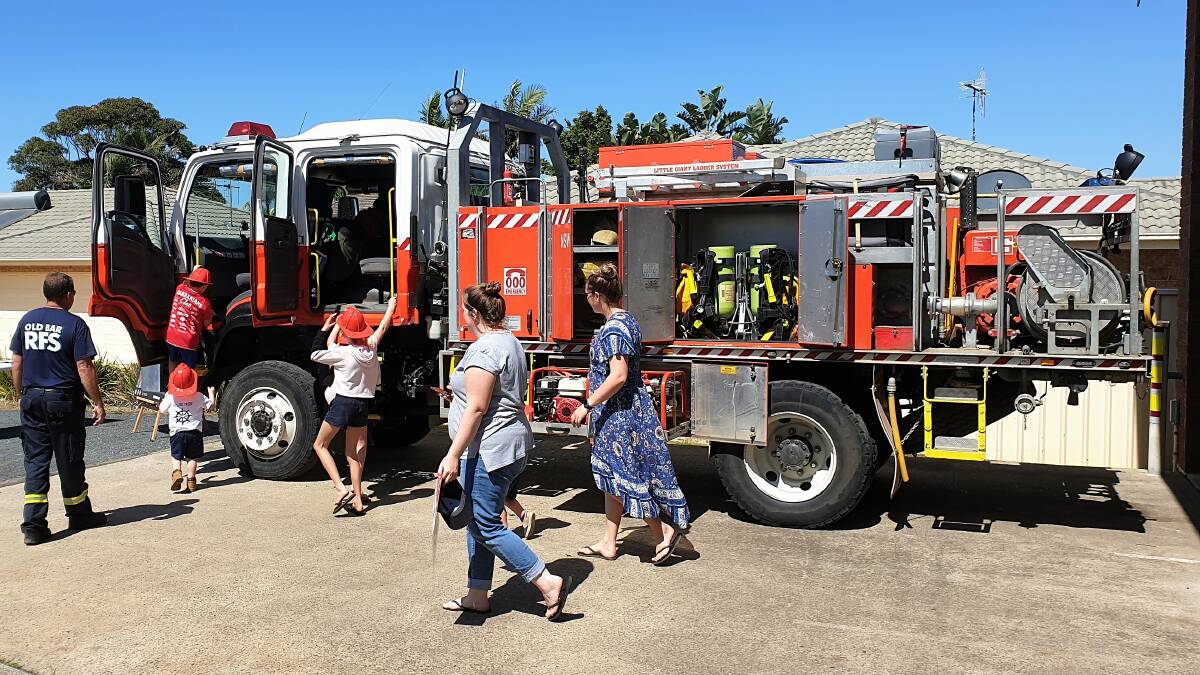 Old Bar RFS vehicle gets a thorough examination from budding fire fighters.