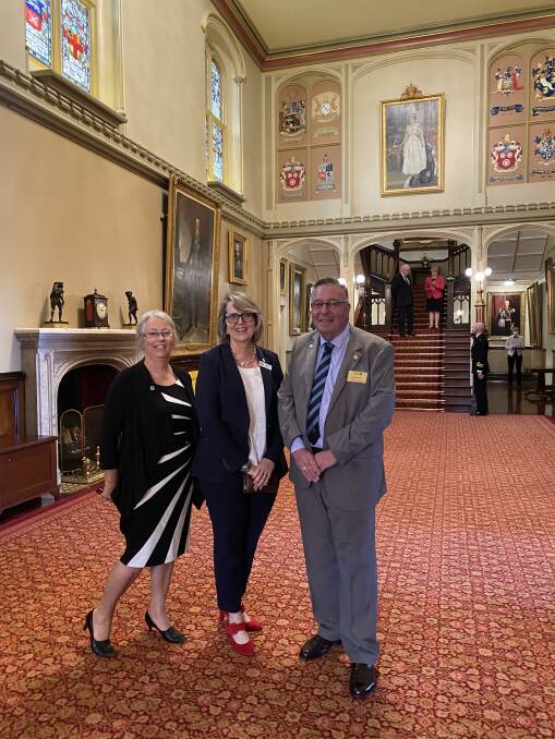 Taree on Manning Rotary's past president Richelle Murray and president Donna Ballard with Laurie Easter assistant governor of Rotary District 9650, Laurie Easter in the foyer of Government House.