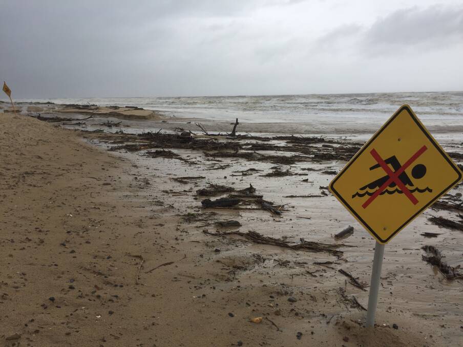 Beaches closed as flood clean-up gets underway