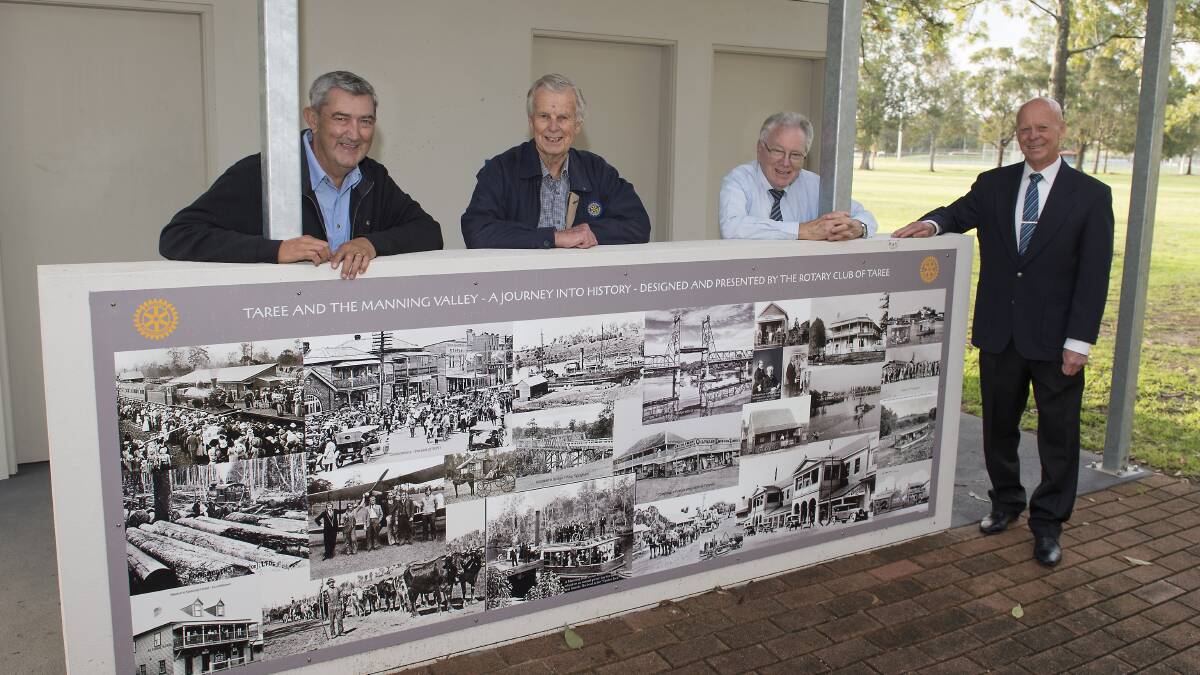 Rotary Club of Taree president Ian Woollard, Rotarians Max Carey and Alan
Small and MidCoast mayor David West with the mural which is now located at Rotary Park.