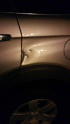 Damage to Glenda Magnussen's vehicle.